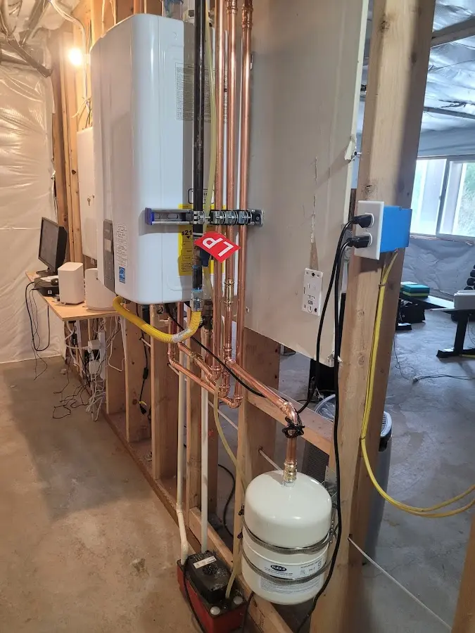 Licensed plumber repairing a kitchen sink in Union Grove