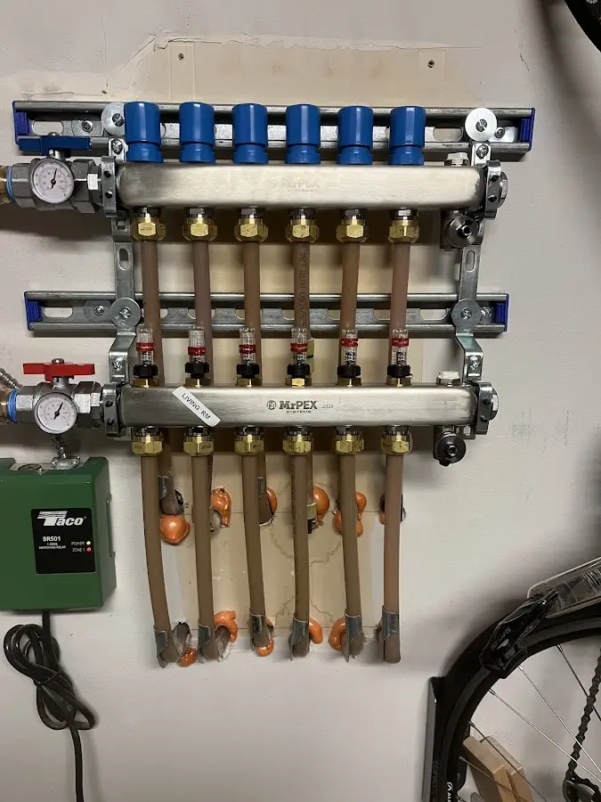 Plumber performing Water Heater Repair at a residential property in Union Grove